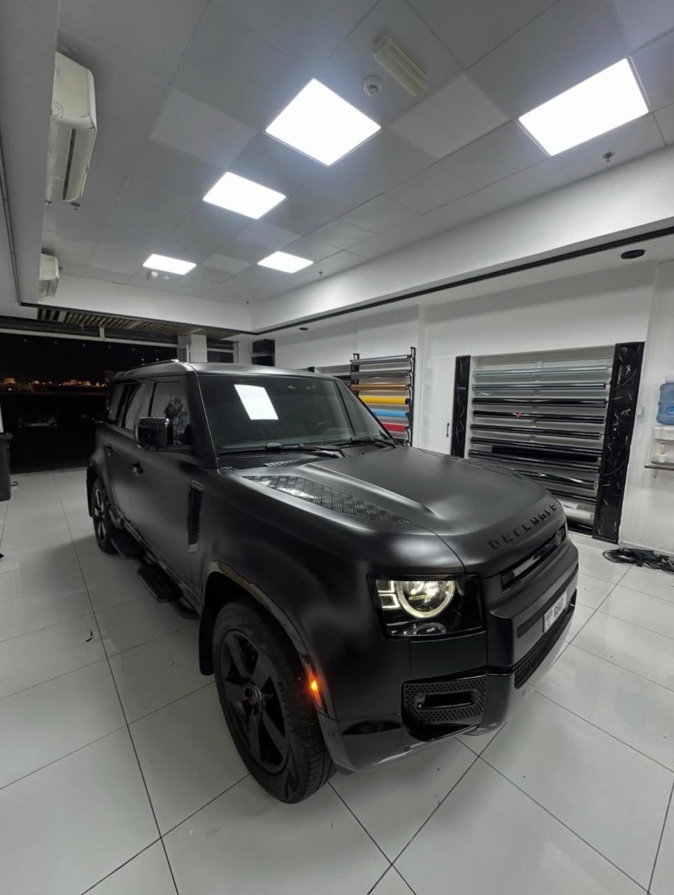 Matte black Land Rover Defender at White Diamond